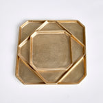 A geometric shape and sleek look make these cast aluminum trays unique. Line with a collection of candles for a golden, contemporary touch. They are dry food safe, so serve your favorite muffins or rolls in style at your next gathering. Amethyst Home provides interior design, new construction, custom furniture, and area rugs in the Monterey metro area.