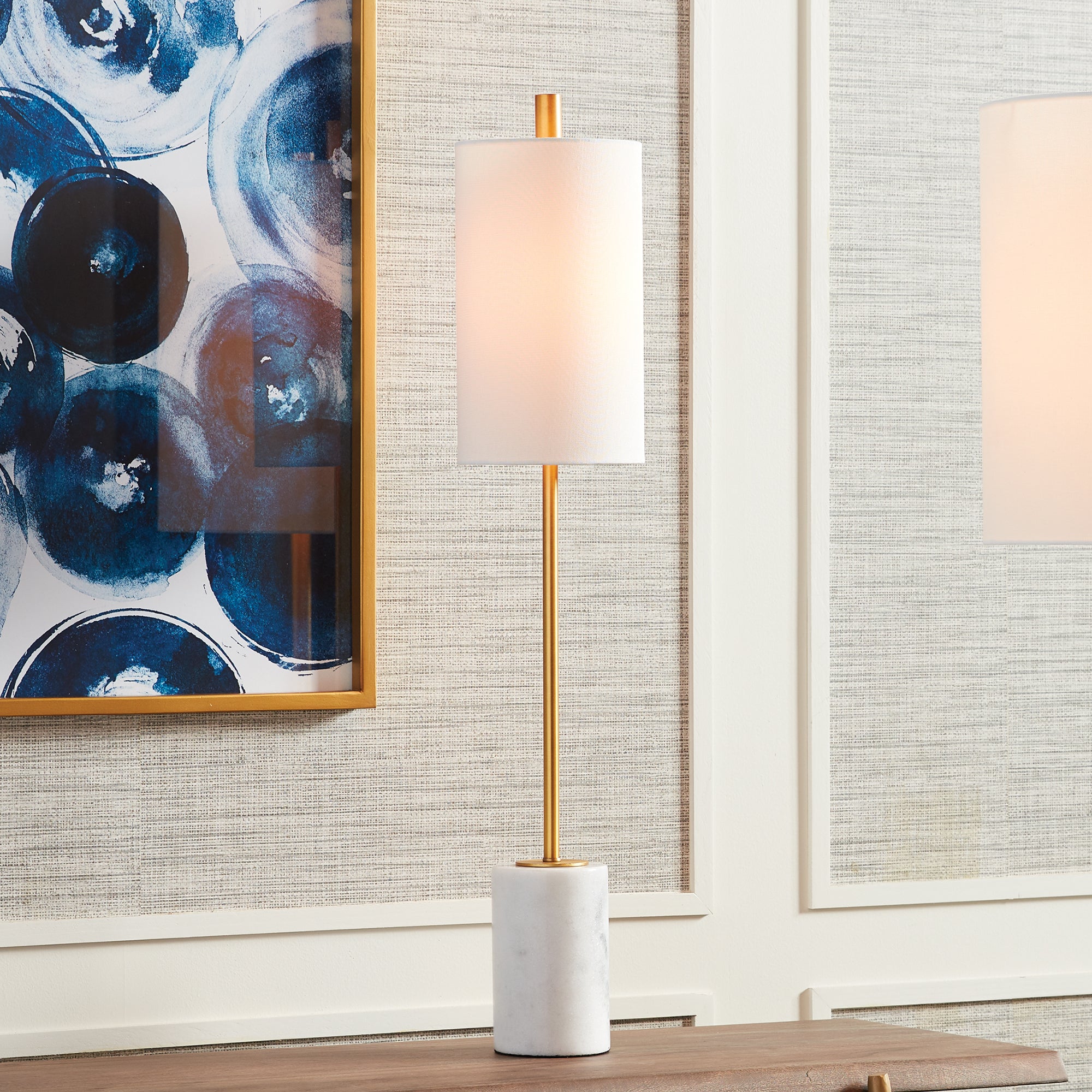 An unexpected mix of marble and brass accents make this lamp a stand out piece. The tall, narrow base and tailored shade are well-designed details not to be missed. Amethyst Home provides interior design, new construction, custom furniture, and area rugs in the Seattle metro area.