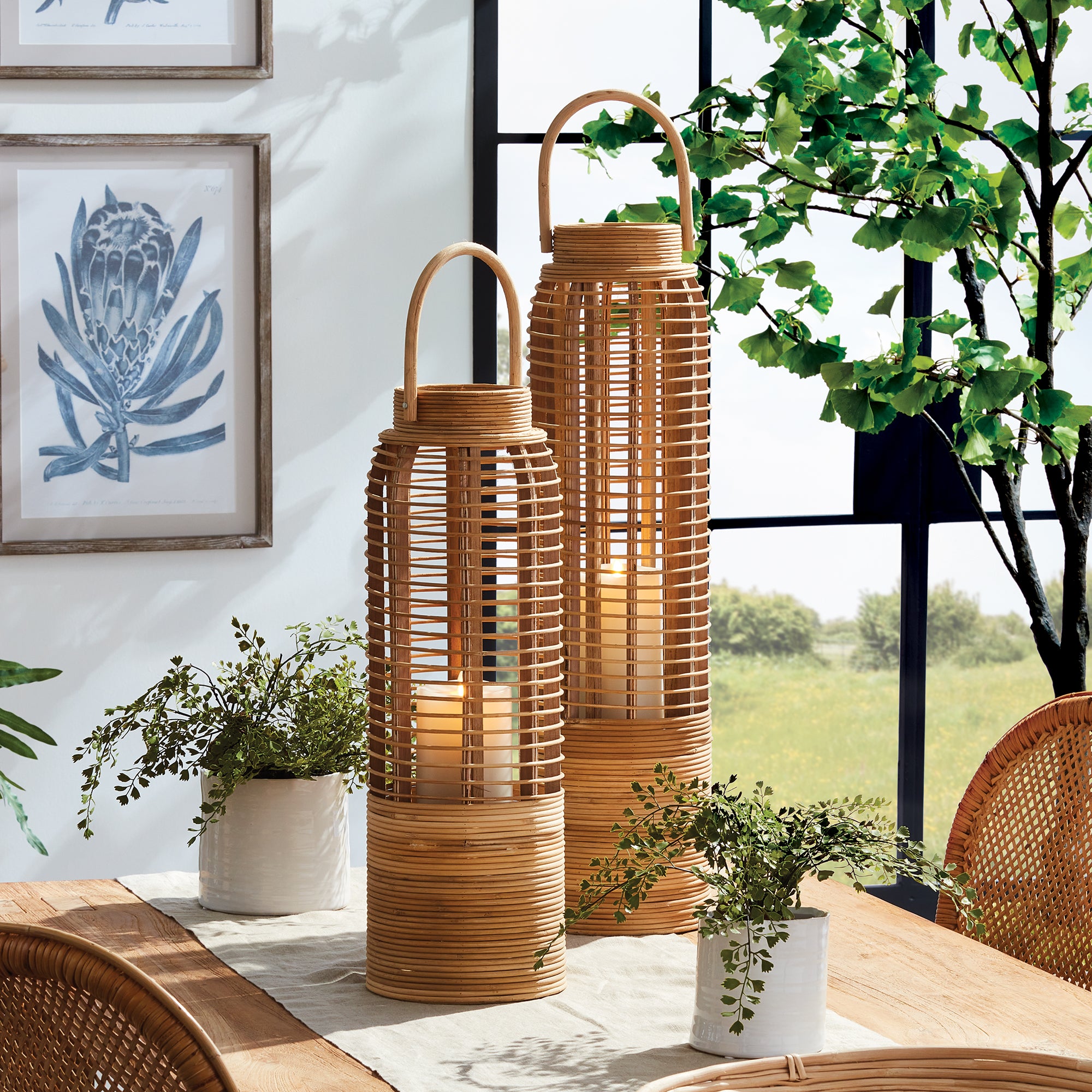 With a tall and slender rattan body, this large scale lantern really makes a statement. At home in the coastal setting or anywhere needing a touch of nature. Amethyst Home provides interior design, new construction, custom furniture, and area rugs in the Alpharetta metro area.