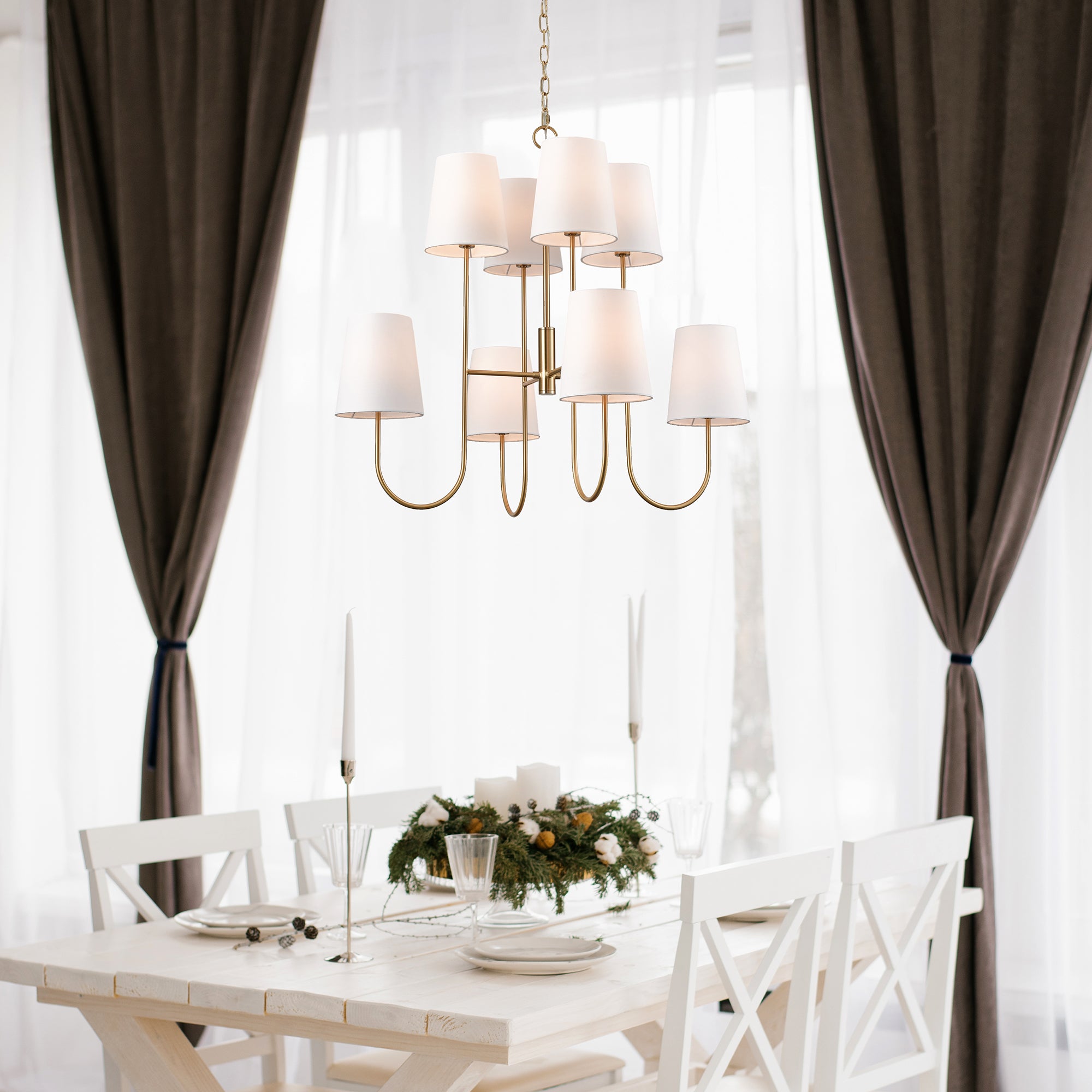 The Kinley Chandelier is a fresh take on a classic two-tiered shape. Subtle modern touches like the tapered shade and gold finish complete the look. Amethyst Home provides interior design, new construction, custom furniture, and area rugs in the Park City metro area.