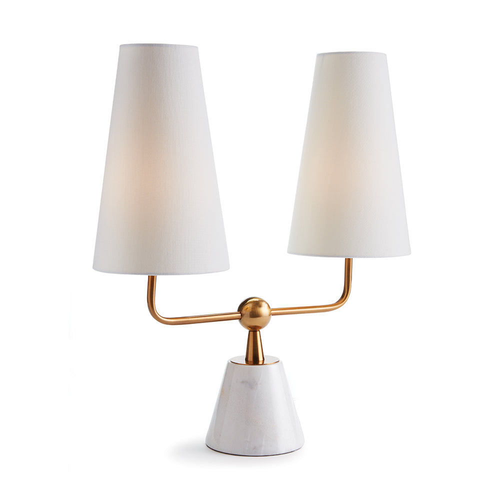 With dramatically elongated shades, the Madison Dublet Lamp is clean and modern. The brass finish and marble base give it a touch of classic elegance. Amethyst Home provides interior design, new construction, custom furniture, and area rugs in the Austin metro area.