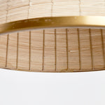 Woven in a natural cane rattan, with subtle variations in color making each one truly unique, this pendant is an instant classic. The brass details on the top and along the bottom rim make it decidedly more refined. And talk about scale! A show-stopping choice for kitchen island, entry foyer or hallway. Amethyst Home provides interior design, new construction, custom furniture, and area rugs in the San Diego metro area.