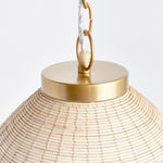 Woven in a natural cane rattan, with subtle variations in color making each one truly unique, this pendant is an instant classic. The brass details on the top and along the bottom rim make it decidedly more refined. And talk about scale! A show-stopping choice for kitchen island, entry foyer or hallway. Amethyst Home provides interior design, new construction, custom furniture, and area rugs in the Washington metro area.