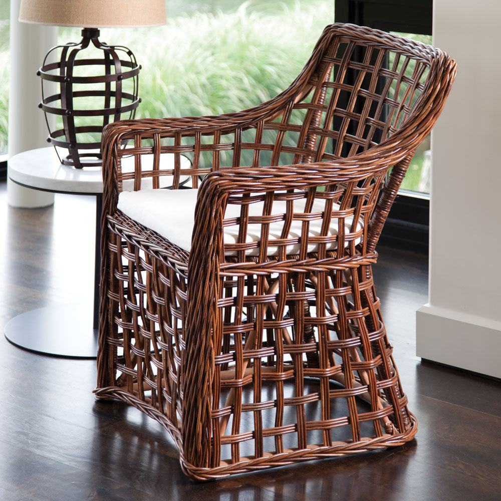 The open weave of this rattan armchair is a shining example of centuries old craftsmanship. Made by some of the world's most accomplished weavers, the Normandy collection is five-star rattan. Amethyst Home provides interior design, new construction, custom furniture, and area rugs in the Dallas metro area.