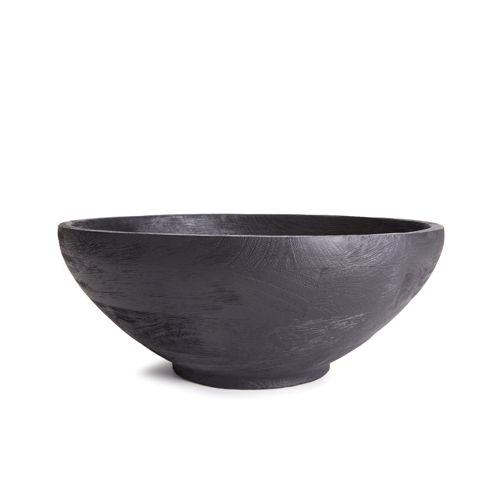 Serve up your best salad in this handcrafted serving bowl. Made of a solid mango wood and stained a dramatic deep black, it is a stunning vessel for your favorite recipes. Amethyst Home provides interior design, new construction, custom furniture, and area rugs in the Newport Beach metro area.
