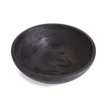 Serve up your best salad in this handcrafted serving bowl. Made of a solid mango wood and stained a dramatic deep black, it is a stunning vessel for your favorite recipes. Amethyst Home provides interior design, new construction, custom furniture, and area rugs in the Seattle metro area.