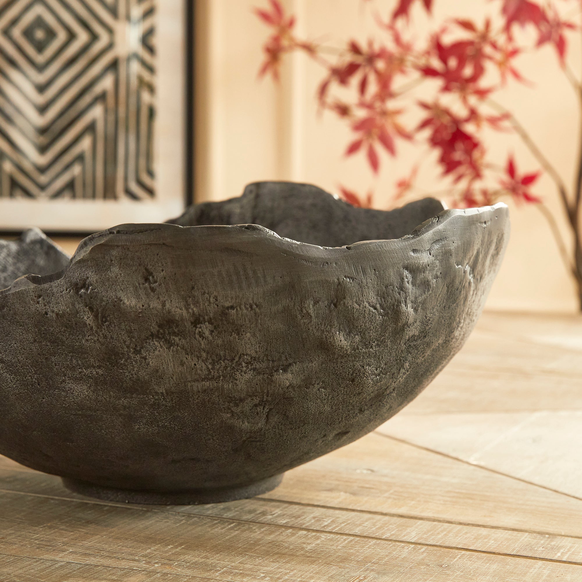 This decorative hand-sculpted bowl is made to be on display. With an oil-rubbed bronze finish and irregular edge, styled or just as it is, a strong statement for the modern space. The epitome of functional art. Amethyst Home provides interior design, new construction, custom furniture, and area rugs in the Los Angeles metro area.