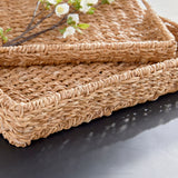 Seagrass is naturally supple, not stiff. Beautiful in color as well as texture. This rectangular set of trays is solidly constructed with an iron frame to keep it's shape. A nice complement to a tall faux stem. Amethyst Home provides interior design, new construction, custom furniture, and area rugs in the Houston metro area.