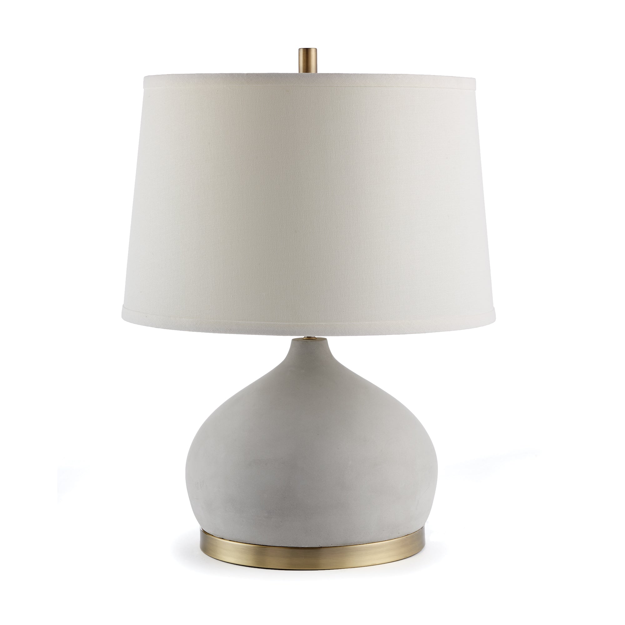 An unexpected mix of cement and brass accents make the Suki lamp a stand out fixture. Extra curvy base and wide shade are details that add style and personality. Amethyst Home provides interior design, new construction, custom furniture, and area rugs in the Miami metro area.