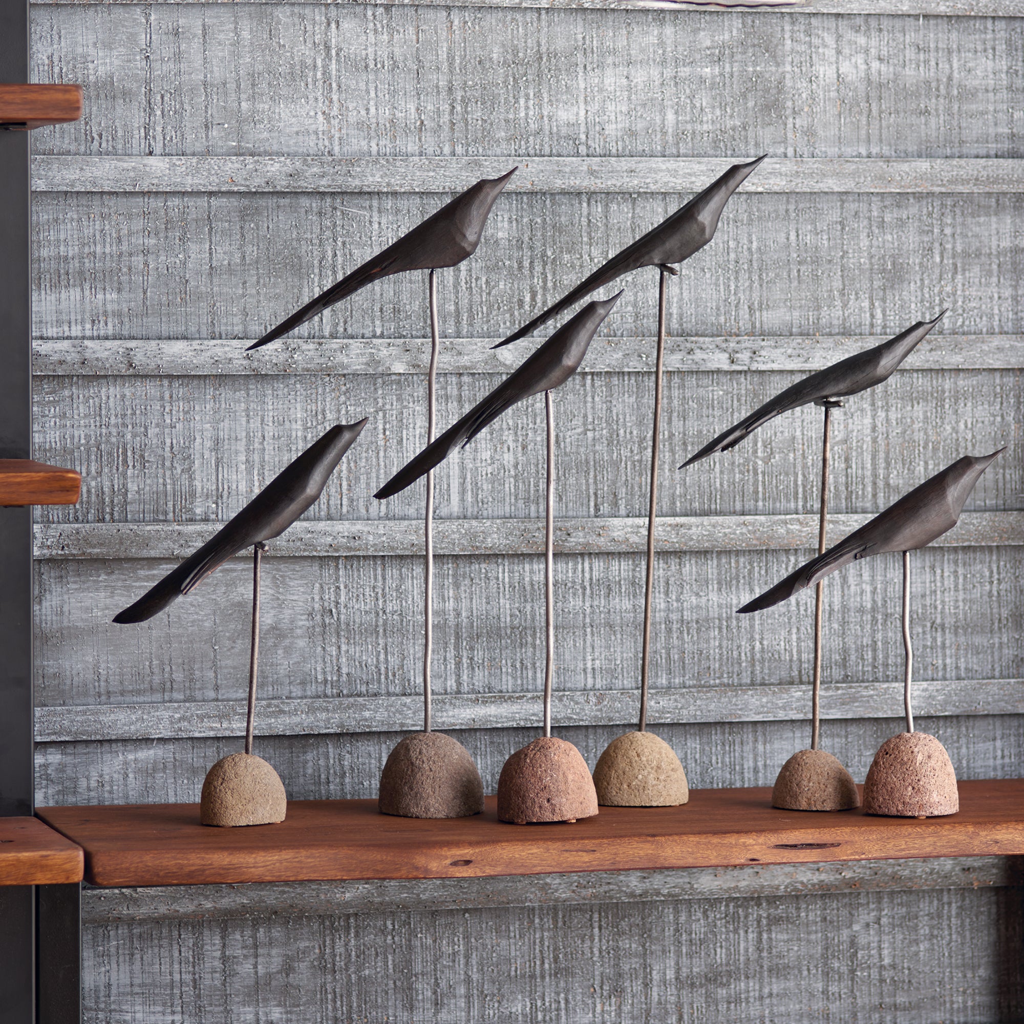 Handcrafted rustic artwork with modern black birds. Amethyst Home provides interior design, new construction, custom furniture, and area rugs in the Park City metro area.