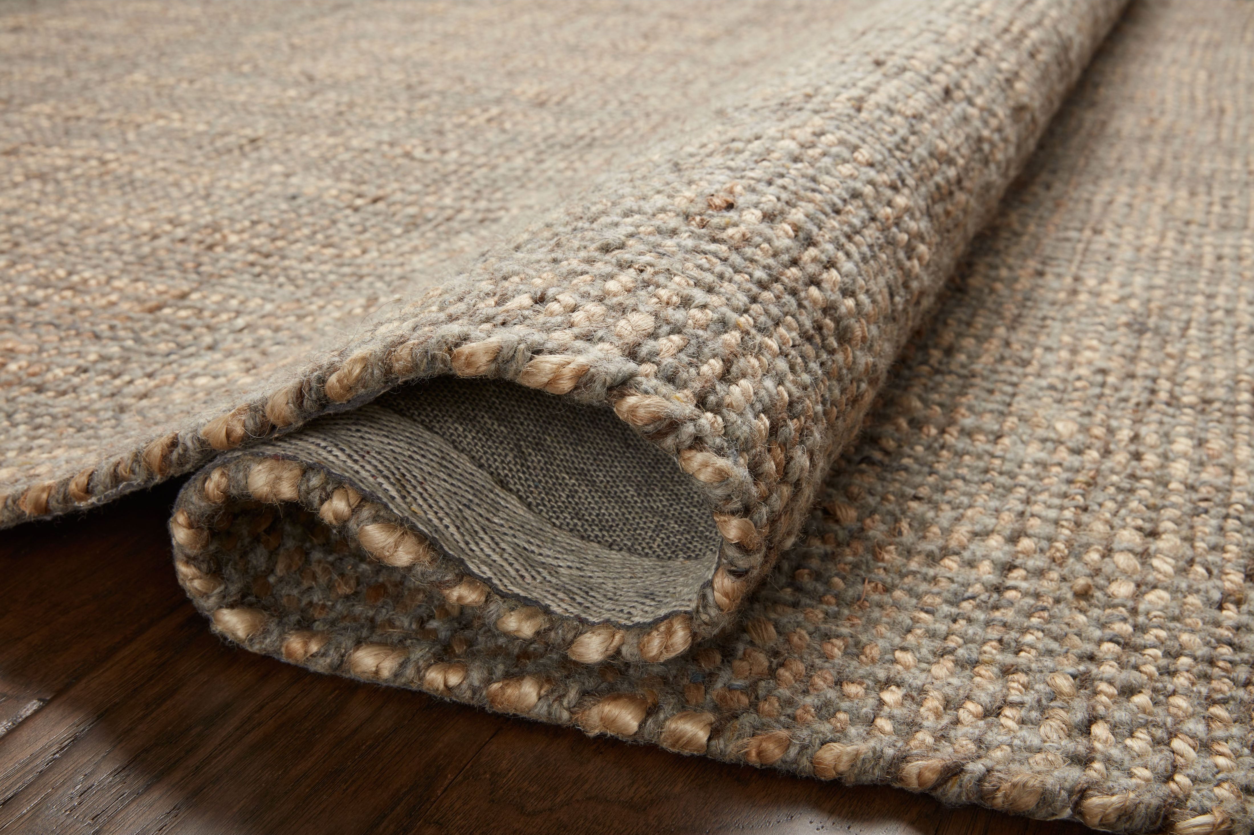 Hand-woven of jute and wool, the Cornwall Mocha / Natural Rug has a natural, organic look with a clean and classic striped design. This area rug collection is an elegant neutral that styles easily in a range of living rooms, bedrooms, dining rooms, and even mudrooms. Soft, earth-toned colors complement the rug’s natural materials and aesthetic. Amethyst Home provides interior design, new construction, custom furniture, and area rugs in the Omaha metro area.