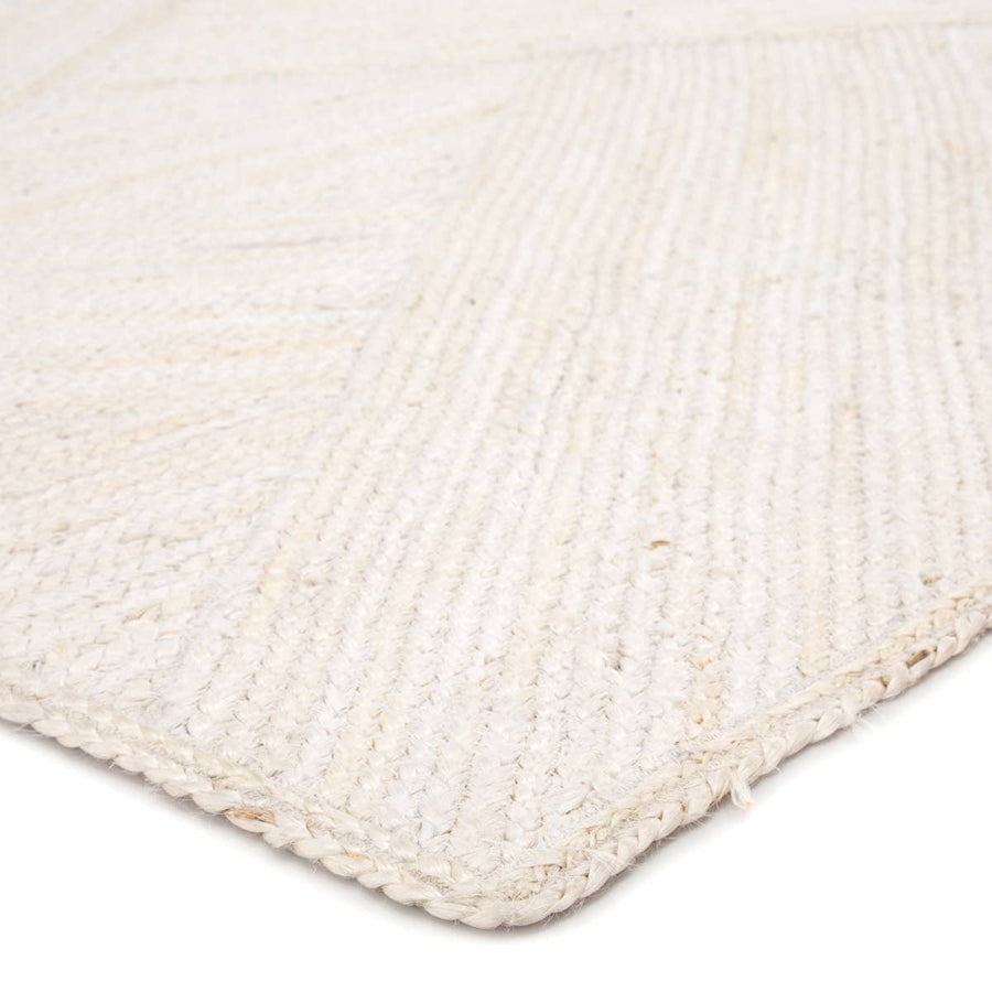 The Naturals Tobago collection delivers rich texture and organic allure to contemporary homes. The Vero area rug showcases a distinctive diagonal weave design, hand woven of bleached jute fibers. The white colorway of this stunning natural lends a chic, contemporary vibe to any space.  Naturals Construction 100% Jute NAT35