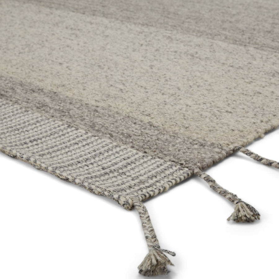 The Nazca Coolidge Area Rug by Jaipur, or NAZ02, is hand-loomed of texture-rich wool. The Coolidge area rug boasts a tonal gray colorway that lends versatility to the simple yet statement-making linear motif. This is a perfect rug for a living room, bedroom, or other high-traffic areas. 