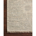 Hand-woven by skilled artisans, the Priya Ivory / Grey Area Rug from Loloi offers beautiful tonal designs accentuated by a carefully curated color palette in tones of ivory and grey. Delicate yet strong, the Priya is blended with wool, cotton, and more and an instant classic made for today's home.