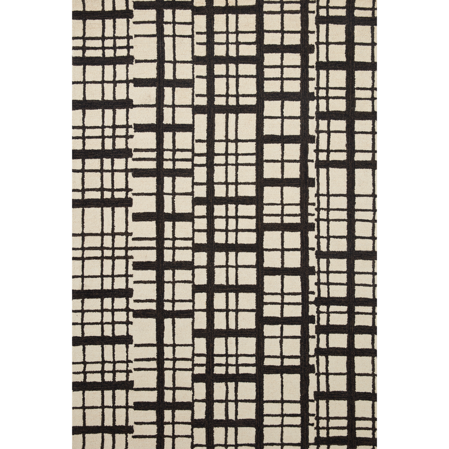 Hand-tufted of wool and jute pile, the Polly POL-02 CJ Black / Ivory rug for Chris Loves Julia x Loloi brings a fresh take on modern yet classic designs. With striking gridded designs toned down by a neutral color palette, Polly is a timeless choice for any room. Amethyst Home provides interior design, new construction, custom furniture, and rugs for the Omaha metro area.
