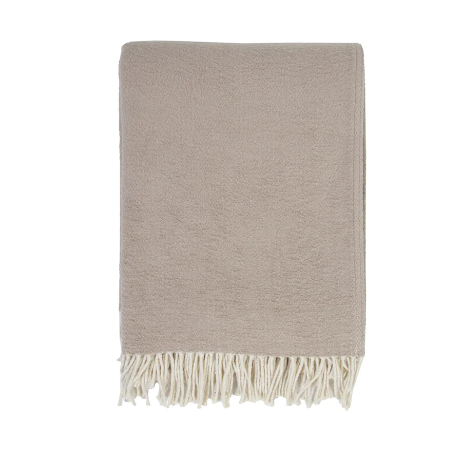 Cozy combed cotton Billie Taupe Throw with a soft ivory interwoven weave ending in tassels.  Amethyst Home provides interior design services, furniture, rugs, and lighting in the Calabasas metro area.