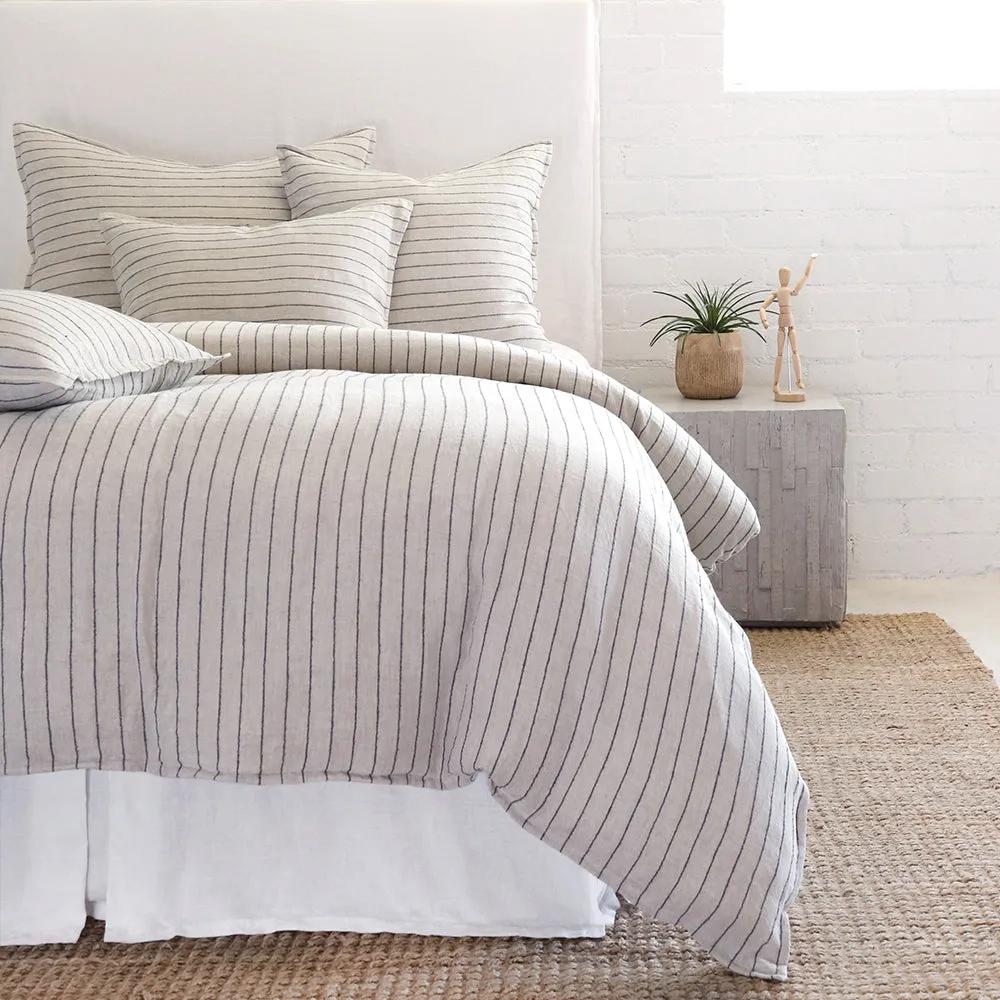 Our Blake Collection features an interwoven stripe texture, giving a modern refresh to a traditional stripe. Our duvet cover and shams are hand-loomed by artisans and the linen is washed for a relaxed lived-in look.The mélange of textures within this woven bedding elevates your space into a sophisticated, yet relaxing retreat. Amethyst Home provides interior design, new home construction design consulting, vintage area rugs, and lighting in the Des Moines metro area.