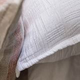 The Harbour White Matelasse Sham features an abstract, geometric weave making it a modern matelasse. The matelasse achieves a beautiful texture without any batting. Amethyst Home provides interior design services, furniture, rugs, and lighting in the Des Moines metro area.