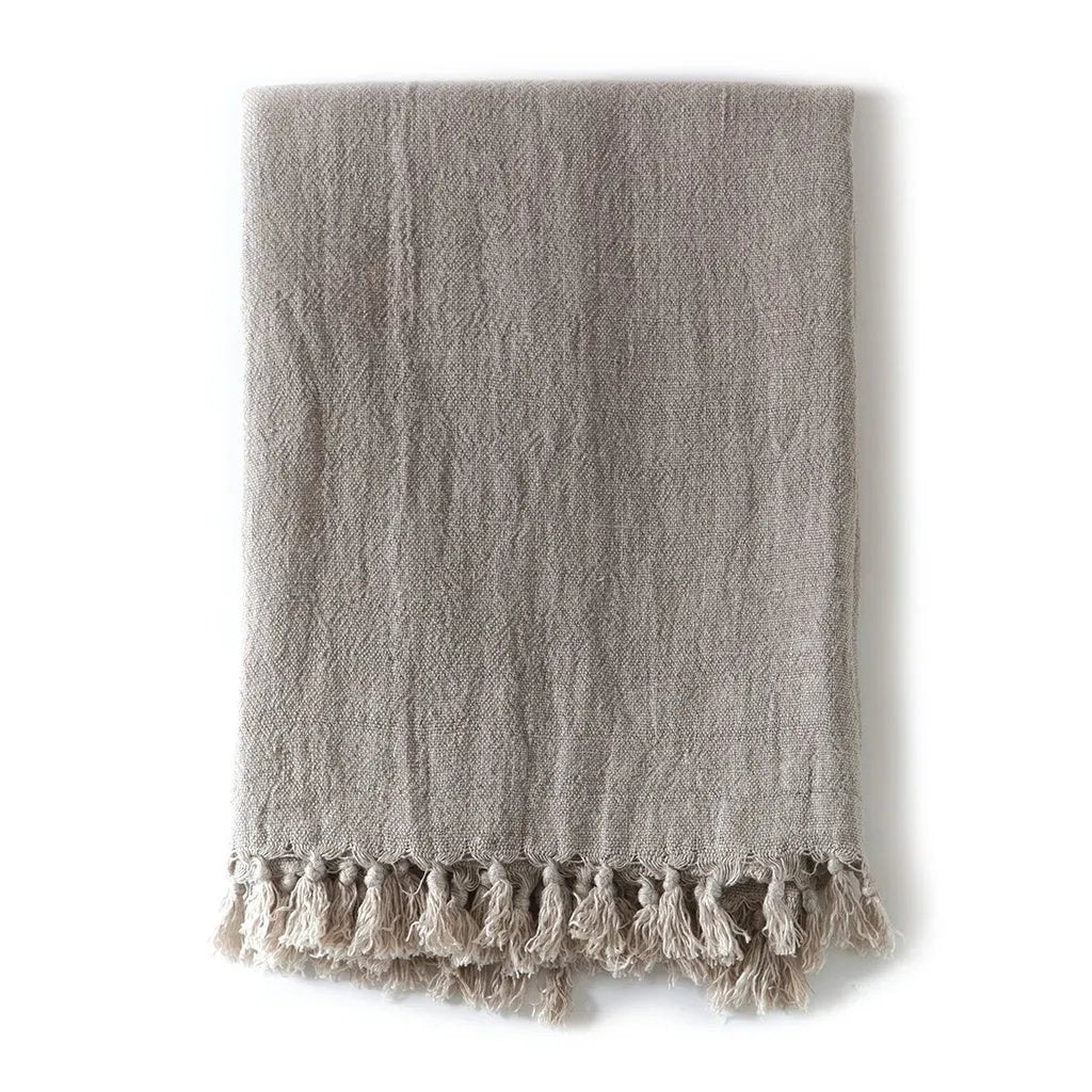 This hand loomed blanket gives beautiful, natural linen texture while staying soft and comfy. Lovely tassels along the top and bottom edges.   Available in 7 colors.   This hand loomed blanket gives beautiful, natural linen texture while staying soft and comfy. Lovely tassels along the top and bottom edges.   Available in 7 colors Amethyst Home provides interior design, new home construction design consulting, vintage area rugs, and lighting in the Charlotte metro area.
