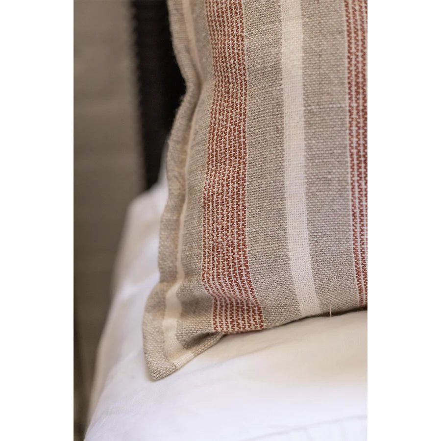 The Montecito Pillow With Insert is a 100% heavy weight hand loomed linen that features alternating thick and thin stripes in a warm color palette of terra cotta and natural surrounded by a 1/2” finished flange. Amethyst Home provides interior design services, furniture, rugs, and lighting in the Kansas City metro area.