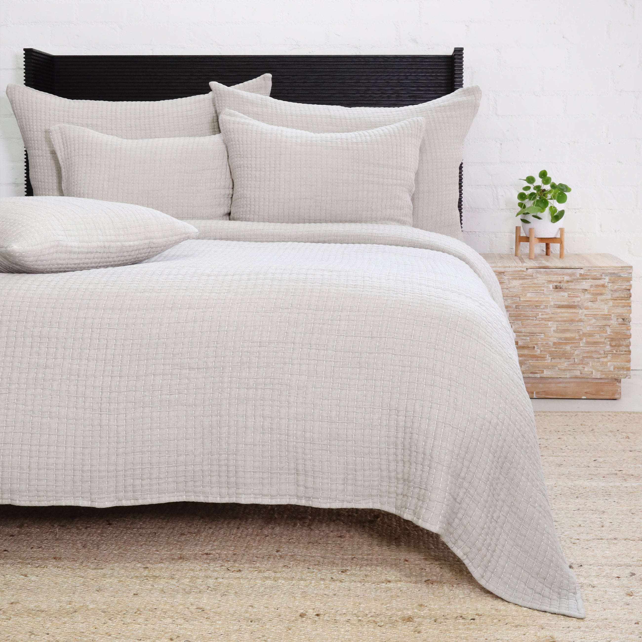 Add textural interest to your bed with the Vancouver Coverlet collection. Made of a lightweight stonewashed cotton gauze with an interwoven ivory stripe, it is the perfect addition to your bed to create a relaxing space. Amethyst Home provides interior design, new construction, custom furniture, and area rugs in the Tampa metro area.