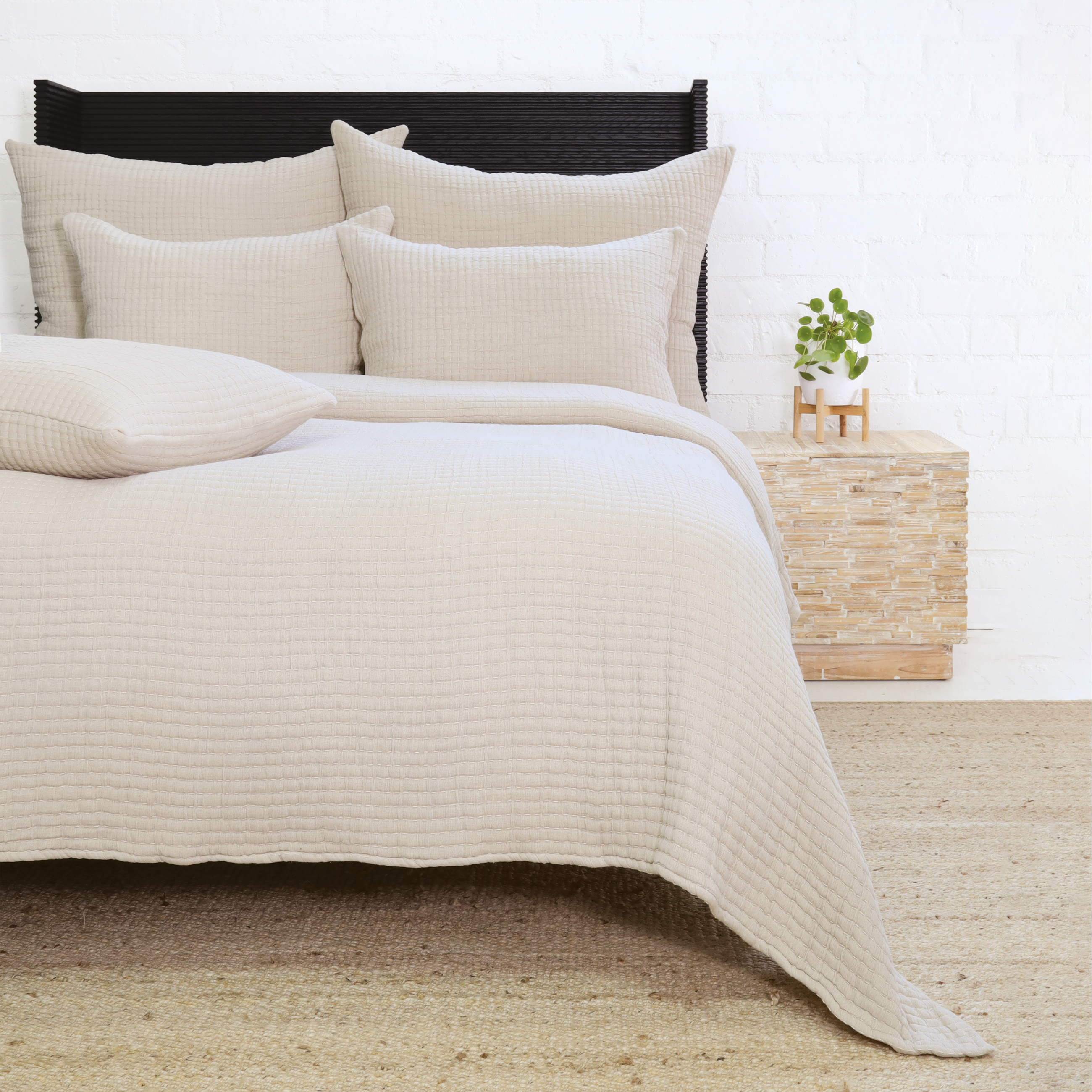 Add textural interest to your bed with the Vancouver Coverlet collection. Made of a lightweight stonewashed cotton gauze with an interwoven ivory stripe, it is the perfect addition to your bed to create a relaxing space. Amethyst Home provides interior design, new construction, custom furniture, and area rugs in the Nashville metro area.