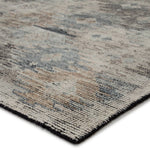 The Jaipur Living Rize Nakoda Area Rug, or RIZ 08, has a dynamic tribal motif that creates an all-over design on the artistically distressed Nakoda area rug. In a black, tan, white, and blue colorway, this durable hand-knotted wool rug is a gorgeous choice for any living room, bedroom, or other high traffic area. 