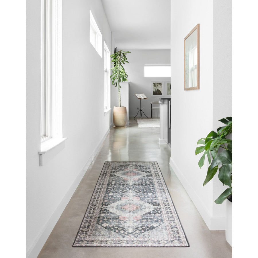 Perfect for families with kids and pets and very easy to clean and maintain. Comes in area, cute kitchen and hallway runner sizes. The rug is gorgeous with an intricate pattern and warms up the room with beautiful color tones. The Skye Charcoal/Multi SKY-02 rug from Loloi captures the spirit of an old-world rug.