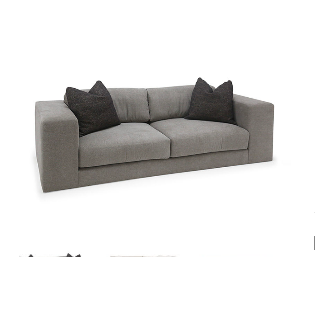 Bring pure and simple style to any environment with the Manuel Sofa. Bench-crafted in Verellen's North Carolina atelier, it features:  spring/down seat construction boxed style bench seat cushion bullnose back pillow with inside-out stitch detail 3″ open flange toss pillows double needle stitch detail on glides only