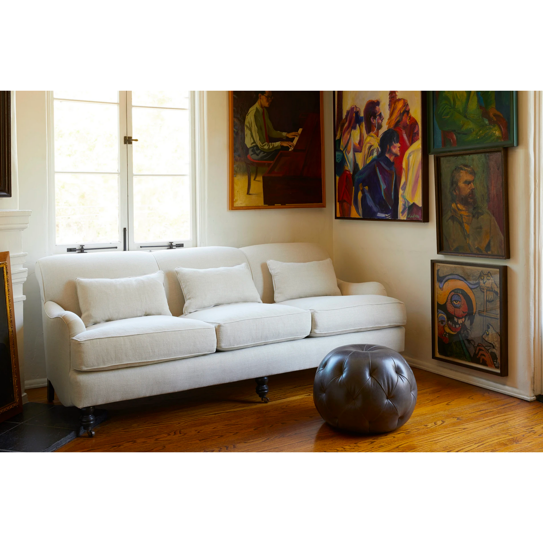 The Beaumont Sofa by Cisco Brothers is a twist on traditional style, with a piping detail and turned front legs with antique casters. Relax into the comfortable lumber pillows for back support with style.  Priced and pictured in grade K fabric Brevard Birch.