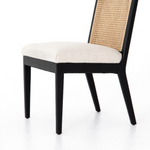 The love the retro style the natural cane of this Antonia Cane Brushed Ebony Armless Dining Chair brings to a dining room.   Size: 22.5"w x 23.5"d x 33"h Materials: 92% Polyester, 8% Li, Nettle Wood, Cane