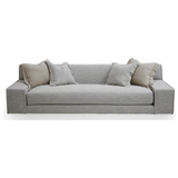 The ultimate low, cozy sofa. We would put this Esme sofa from Verellen in the family room, living room, or movie theater. The juxtaposition of a juicy, miniature-spring filled down-wrapped cushion and firm back is ultra comfortable. We love the thick, firm arms for resting cell phones & snacks. Enjoy this sofa upholstered or slipcovered.