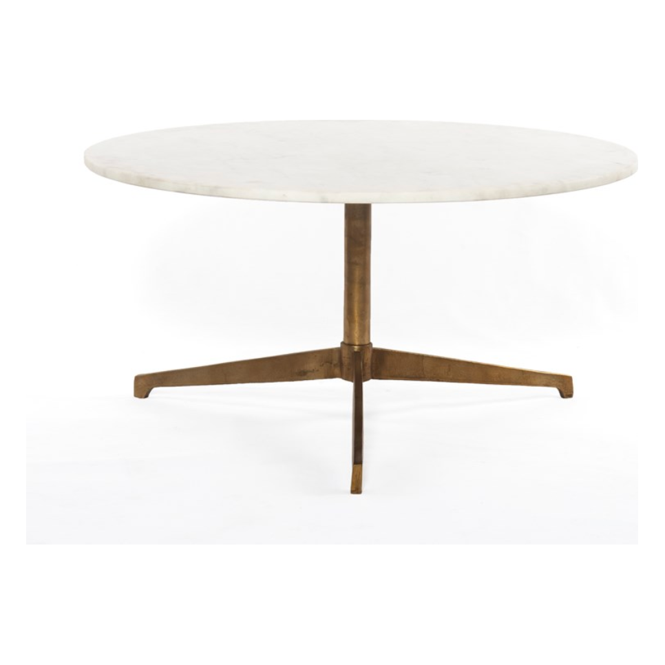 Simple, sophisticated style. The Helen Round Coffee Table has a slim tripod base of raw brass supports a rounded tabletop of polished white marble. Petite scale perfect for smaller spaces or rooms with a sectional.
