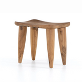 Featuring Zuri Outdoor Stool - Aged Natural Teak by Four Hands at Amethyst Home. Inspired by West African design, natural teak features organic knots, holes and graining to reflect its materials' rich roots, indoors or out. Cover or store inside during inclement weather and when not in use.
Overall Dimensions: 20"W x 13"L x 17"HColors: Aged Natural Tea.  Amethyst Home provides interior design, new home construction design consulting, vintage area rugs, and lighting in the Newport Beach metro area.