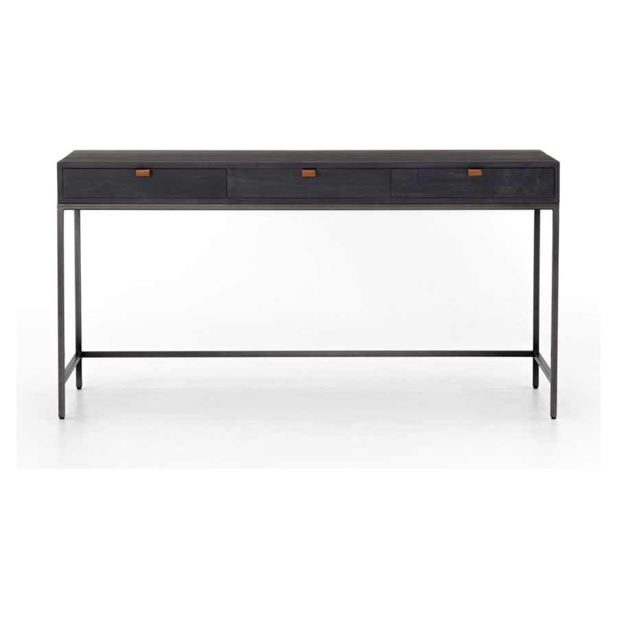 The Trey Black Wash Poplar Modular Writing Desk sleek and simple, black-finished poplar offers plenty of desk storage by way of three spacious drawers. Metal-secured pulls of top-grain leather add a textural element of surprise. Great solo or paired with matching corner desk, file cabinet or credenza.