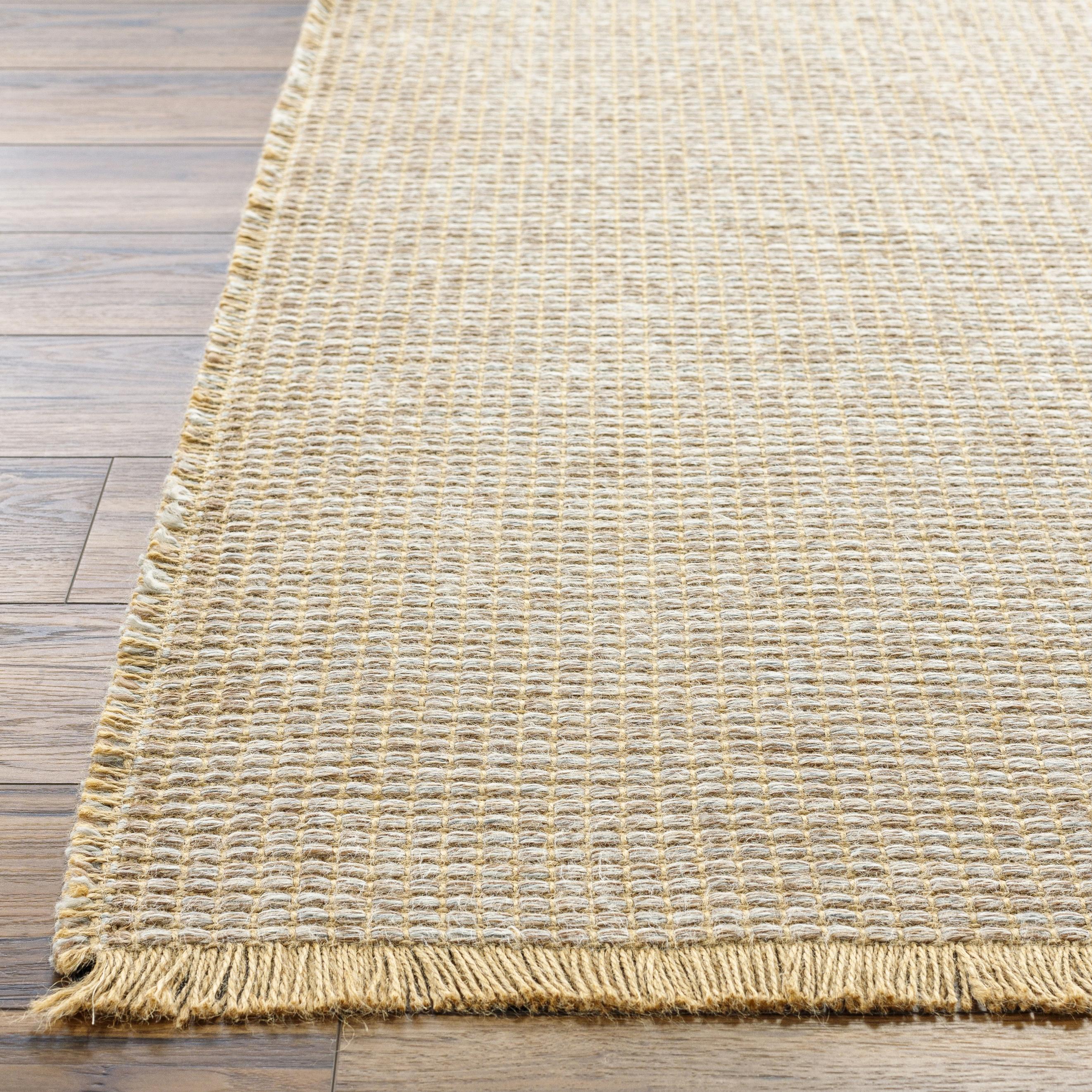 This exquisite Kimi area rug from our Becki Owens x Surya line is the perfect combination of style and comfort. Crafted from a unique blend of polypropylene and jute, this rug features a beautiful stitched design that will bring a touch of elegance to any space. Amethyst Home provides interior design, new home construction design consulting, vintage area rugs, and lighting in the Alpharetta metro area.