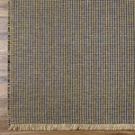 This beautiful Kimi area rug is the perfect addition to any room in your home. The special collaboration between Surya and Becki Owens has created a unique, eye-catching design that will bring texture and style to your space. The rug is made from polypropylene and jute, creating a textural woven pattern in natural tones with dark contrast. Amethyst Home provides interior design, new home construction design consulting, vintage area rugs, and lighting in the Calabasas metro area.