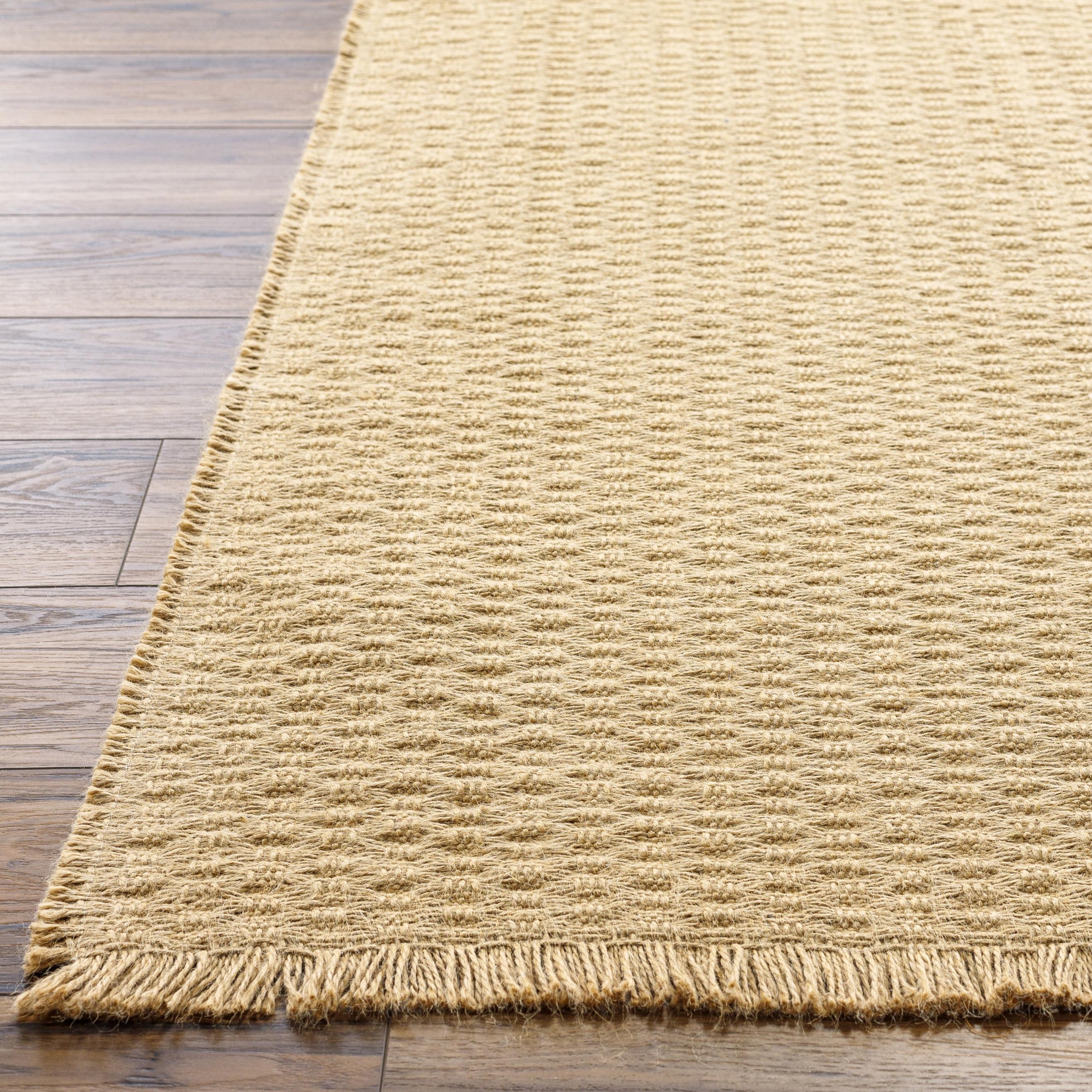 Introducing the stunning Kimi area rug – a special collaboration piece between Surya and Becki Owens. This beautiful rug is the perfect addition to any room to bring a touch of timeless elegance and style. Crafted from high-quality jute, this rug features a unique texture that adds visual interest and dimension to your space. Amethyst Home provides interior design, new home construction design consulting, vintage area rugs, and lighting in the Charlotte metro area.