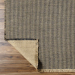 This beautiful Kimi area rug is the perfect addition to any room in your home. The special collaboration between Surya and Becki Owens has created a unique, eye-catching design that will bring texture and style to your space. The rug is made from polypropylene and jute, creating a textural woven pattern in natural tones with dark contrast. Amethyst Home provides interior design, new home construction design consulting, vintage area rugs, and lighting in the Los Angeles metro area.
