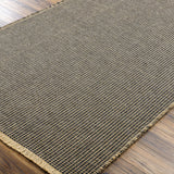 This beautiful Kimi area rug is the perfect addition to any room in your home. The special collaboration between Surya and Becki Owens has created a unique, eye-catching design that will bring texture and style to your space. The rug is made from polypropylene and jute, creating a textural woven pattern in natural tones with dark contrast. Amethyst Home provides interior design, new home construction design consulting, vintage area rugs, and lighting in the Tampa metro area.