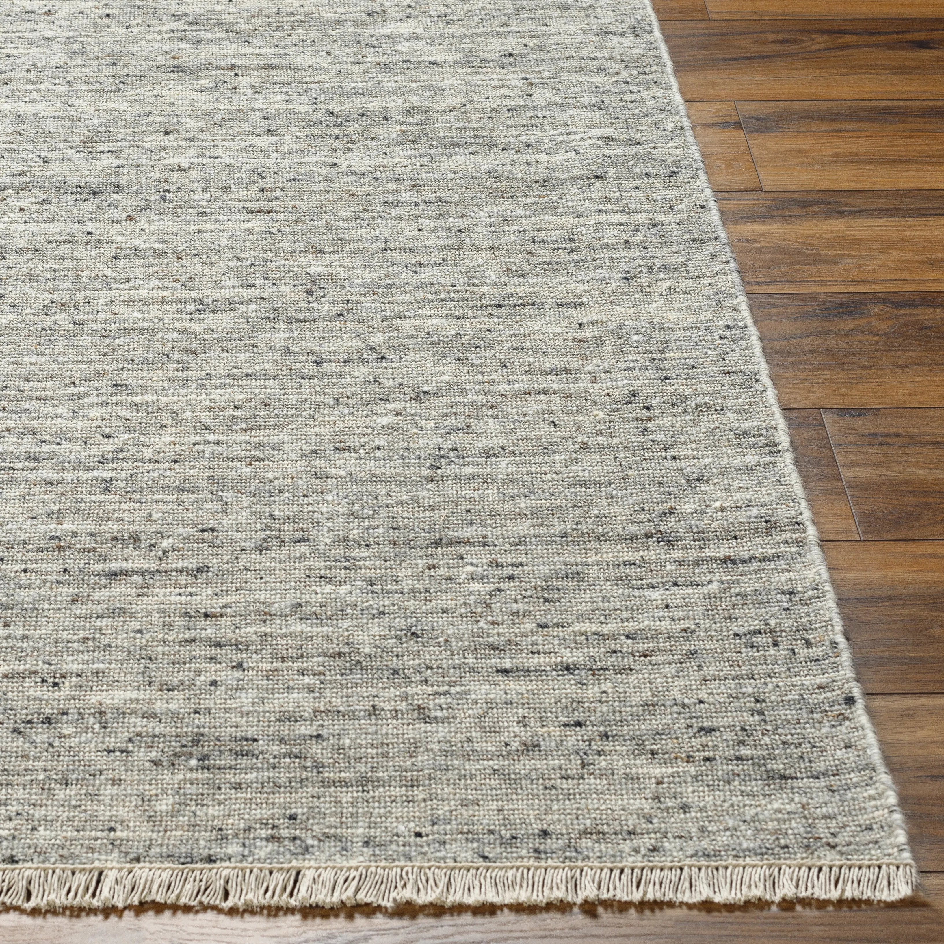 The simplistic yet compelling rugs from the Hamburg Collection effortlessly serve as the exemplar representation of modern decor. These Hand Loomed pieces are exquisitely crafted and offer natural class and grace to your decor space. Made with Wool in India, and has Low Pile. Spot Clean Only, One Year Limited Warranty.Hand Loome Amethyst Home provides interior design, new home construction design consulting, vintage area rugs, and lighting in the Austin metro area.