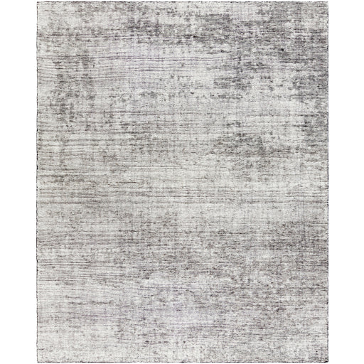 The simplistic yet compelling rugs from the Malaga Archer effortlessly serve as the exemplar representation of modern decor. Amethyst Home provides interior design, new home construction design consulting, vintage area rugs, and lighting in the Scottsdale metro area.