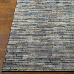 The simplistic yet compelling rugs from the Malaga Collection effortlessly serve as the exemplar representation of modern decor. With their Hand-Knotted construction, these rugs provide a durability that can not be found in other handmade constructions, and boasts the ability to be thoroughly cleaned as it contains no chemicals that react to water, such as glue. Amethyst Home provides interior design, new construction, custom furniture, and area rugs in the Winter Garden metro area