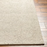 The simplistic yet compelling rugs from the Mia Collection effortlessly serve as the exemplar representation of modern decor. The meticulously woven construction of these pieces boasts durability and will provide natural charm into your decor space. Made with Wool in India, and has No Pile. Spot Clean Only, One Year Limited Warranty. Amethyst Home provides interior design, new construction, custom furniture, and rugs for Houston metro area