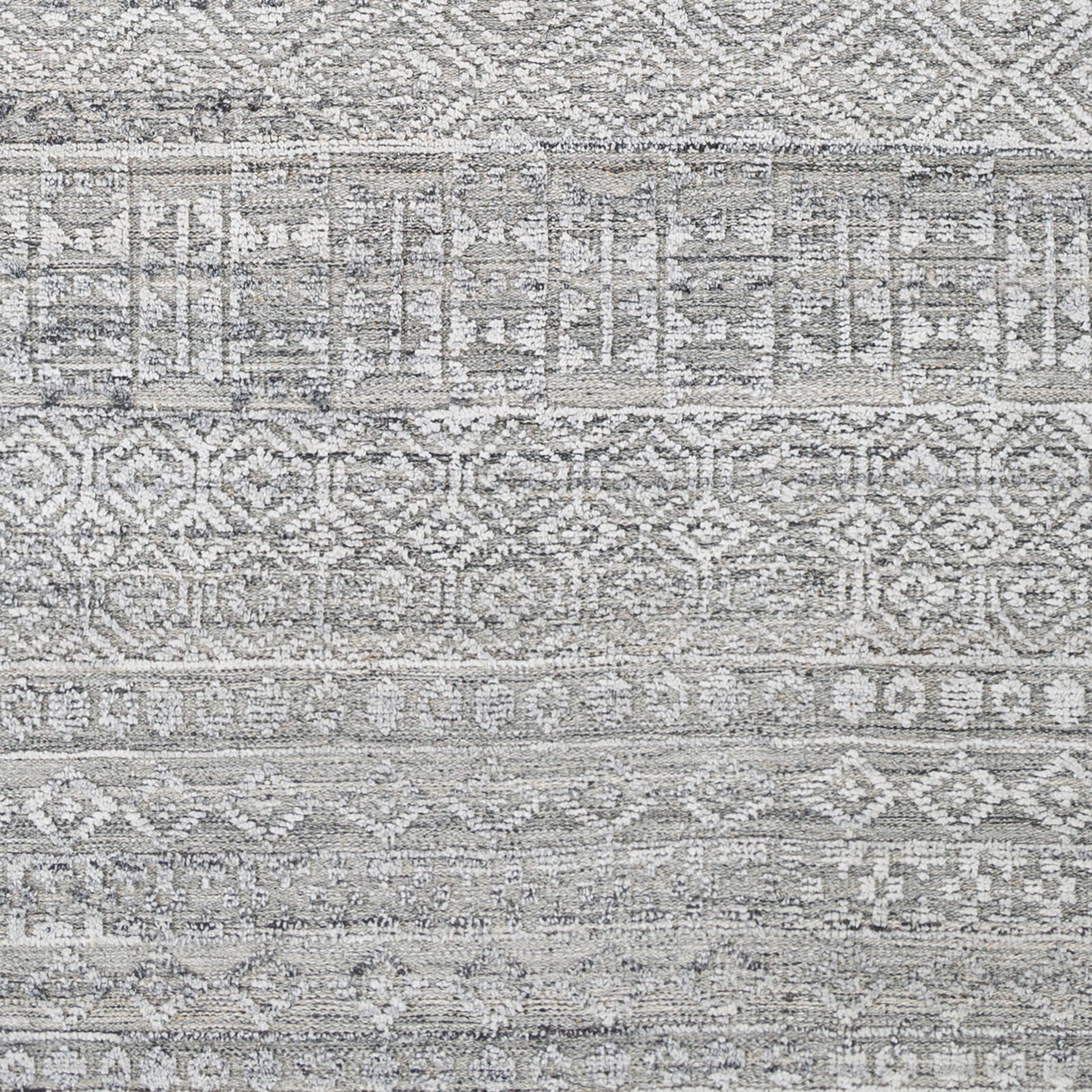 Add a touch of rustic elegance to your home with the Pompei Pewter / Silver hand-knotted rug by Surya featuring recycled PET yarn. Amethyst Home provides interior design, new construction, custom furniture, and area rugs in the Boston metro area.