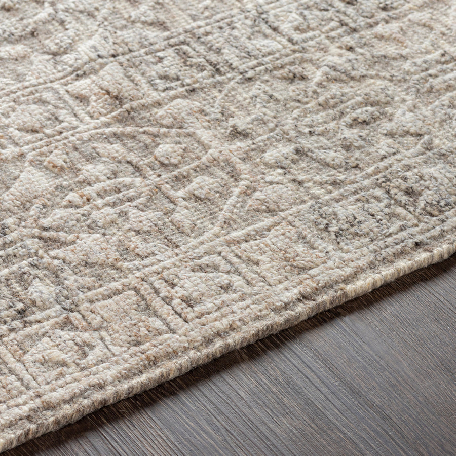 The Tunus Silver Rug features a globally inspired design made from wool. The hand-knotted rug adds wabi sabi charm to any room. Amethyst Home provides interior design, new home construction design consulting, vintage area rugs, and lighting in the Scottsdale metro area.