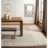 The Tunus Mirrh Rug features a globally inspired design made from New Zealand wool. The hand-knotted rug adds wabi sabi charm to any room. Amethyst Home provides interior design, new home construction design consulting, vintage area rugs, and lighting in the Charlotte metro area.