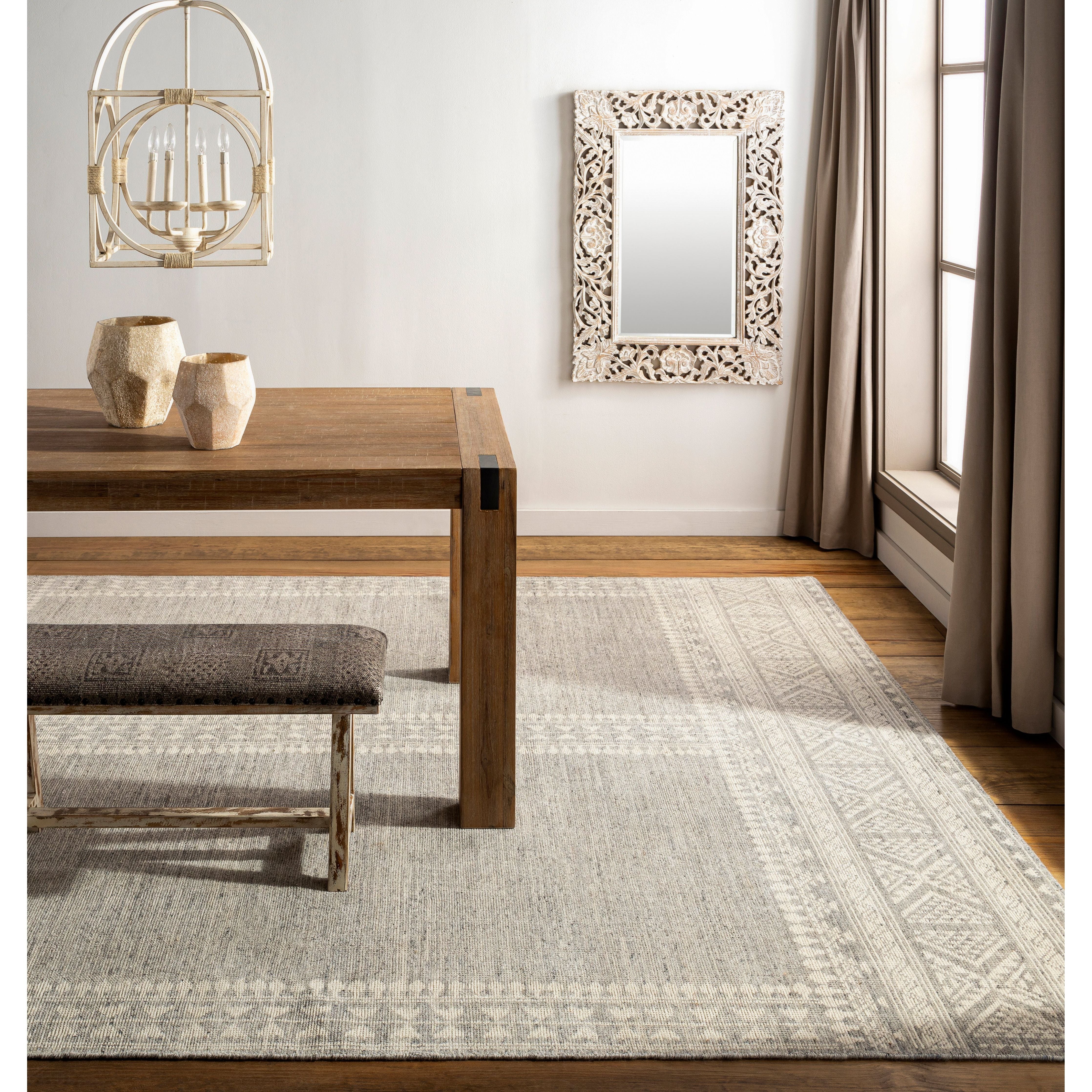 The Tunus Mirrh Rug features a globally inspired design made from New Zealand wool. The hand-knotted rug adds wabi sabi charm to any room. Amethyst Home provides interior design, new home construction design consulting, vintage area rugs, and lighting in the Charlotte metro area.