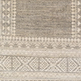 The Tunus Mirrh Rug features a globally inspired design made from New Zealand wool. The hand-knotted rug adds wabi sabi charm to any room. Amethyst Home provides interior design, new home construction design consulting, vintage area rugs, and lighting in the Houston metro area.