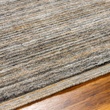 The simplistic yet compelling rugs from the Yasmin Collection effortlessly serve as the exemplar representation of modern decor. With their hand knotted construction, these rugs provide a durability that can not be found in other handmade constructions, and boasts the ability to be thoroughly cleaned as it contains no chemicals that react to water, such as glue. AmethystHome provides interior design, new construction, custom furniture, and rugs for Winter Garden metro area